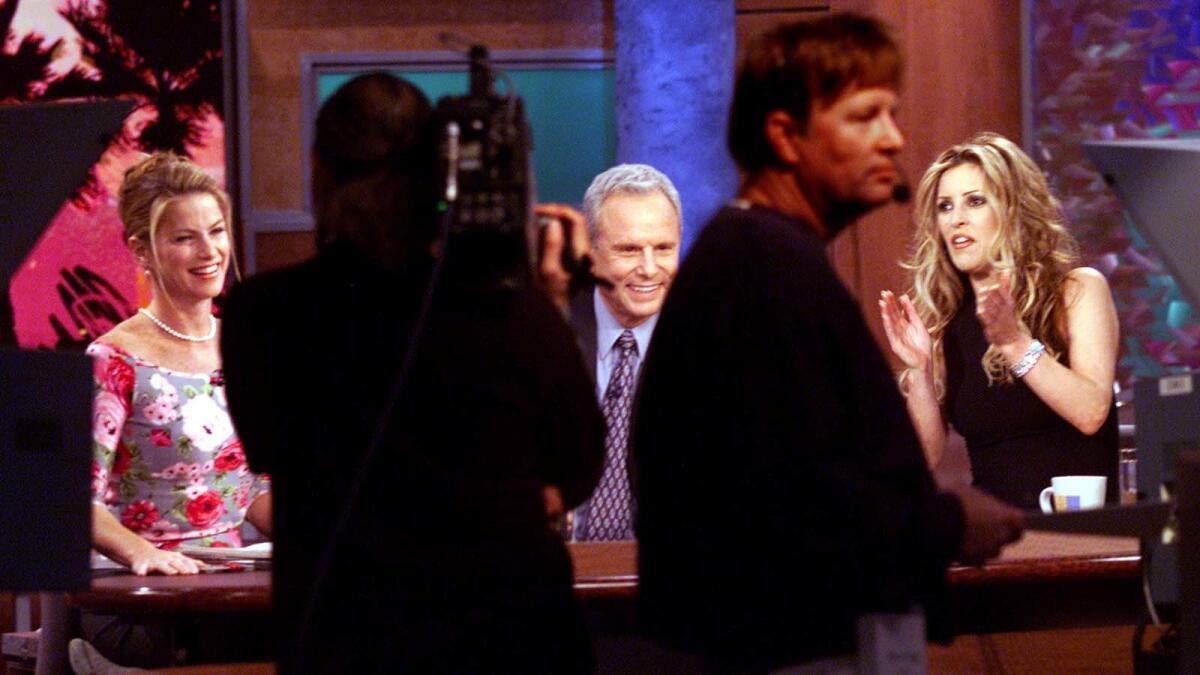 Jillian Barberie, right, hosts "Good Day Live" with Dorothy Lucey, left, and Steve Edwards in 2001.