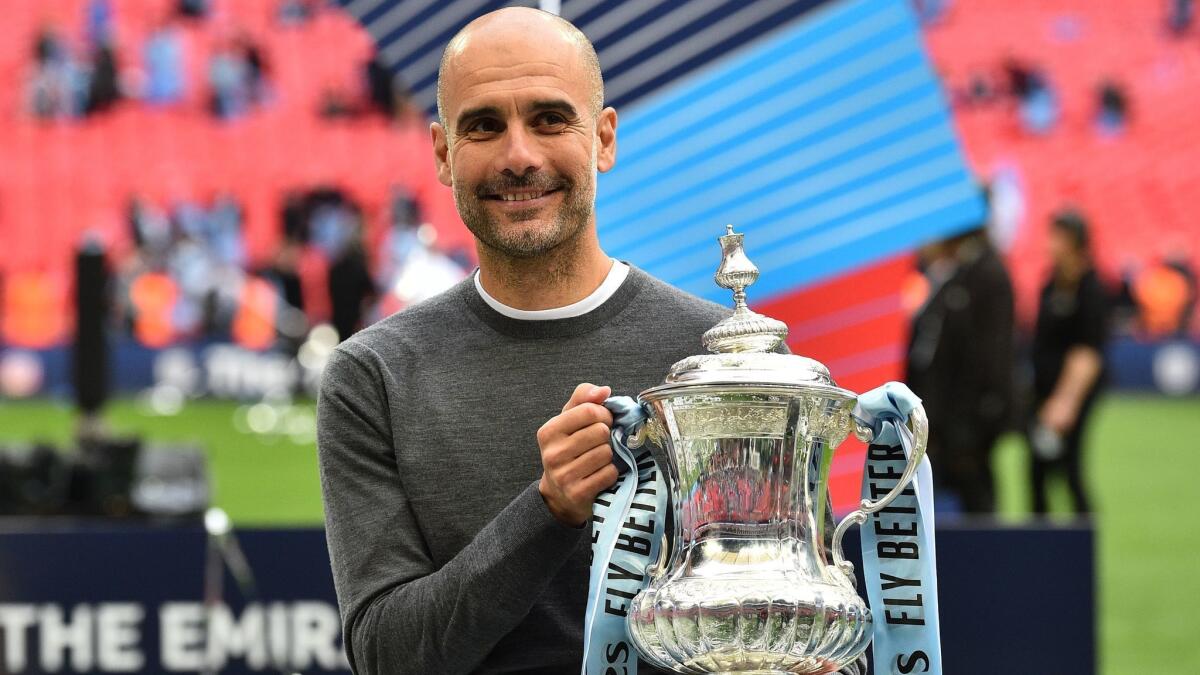 For manager Pep Guardiola and Manchester City, a sweep of the English Premier League, League Cup and FA Cup left them one title short of supremacy.