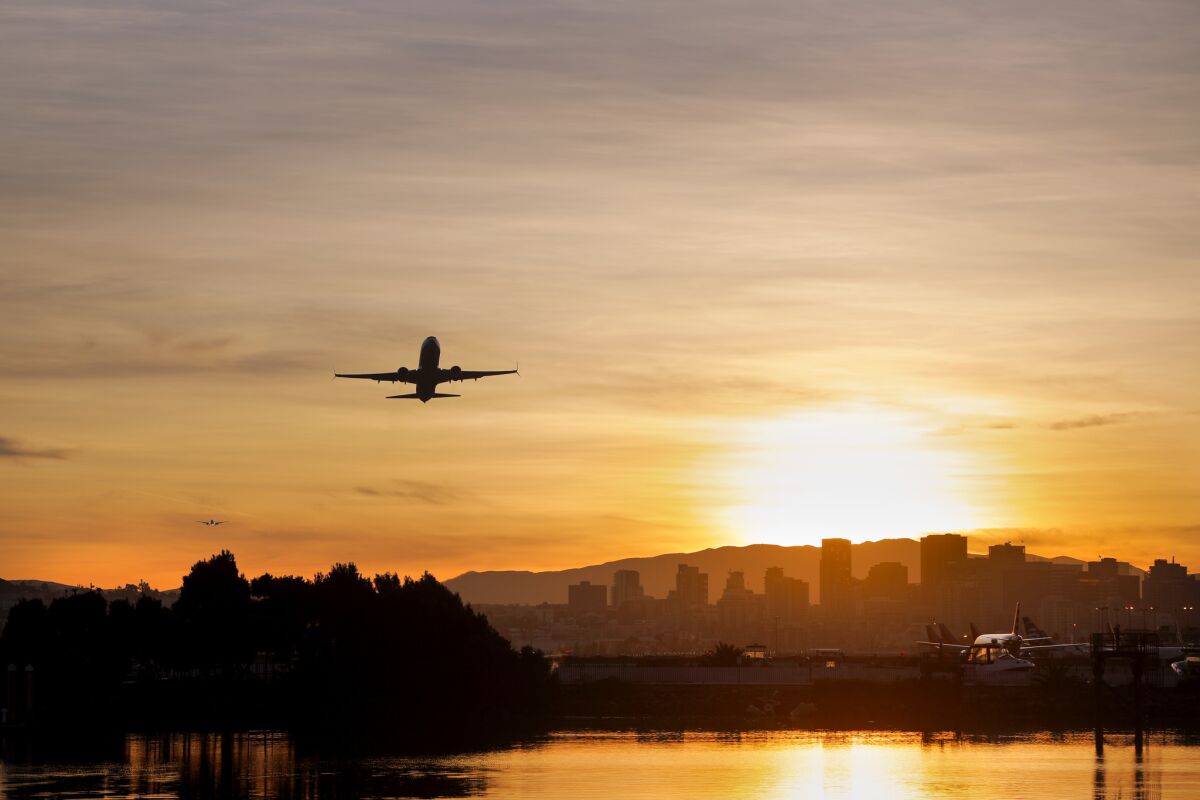 A flight departs San Diego International Airport.