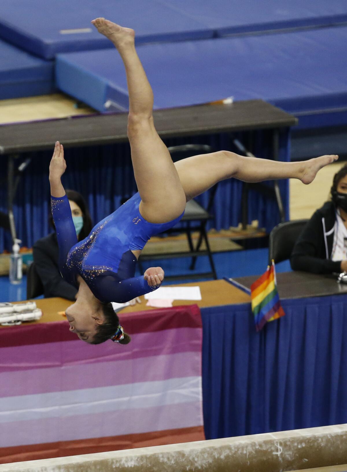 UCLA's Kendal Poston competes on the balance beam against San Jose State on March 12, 2021.
