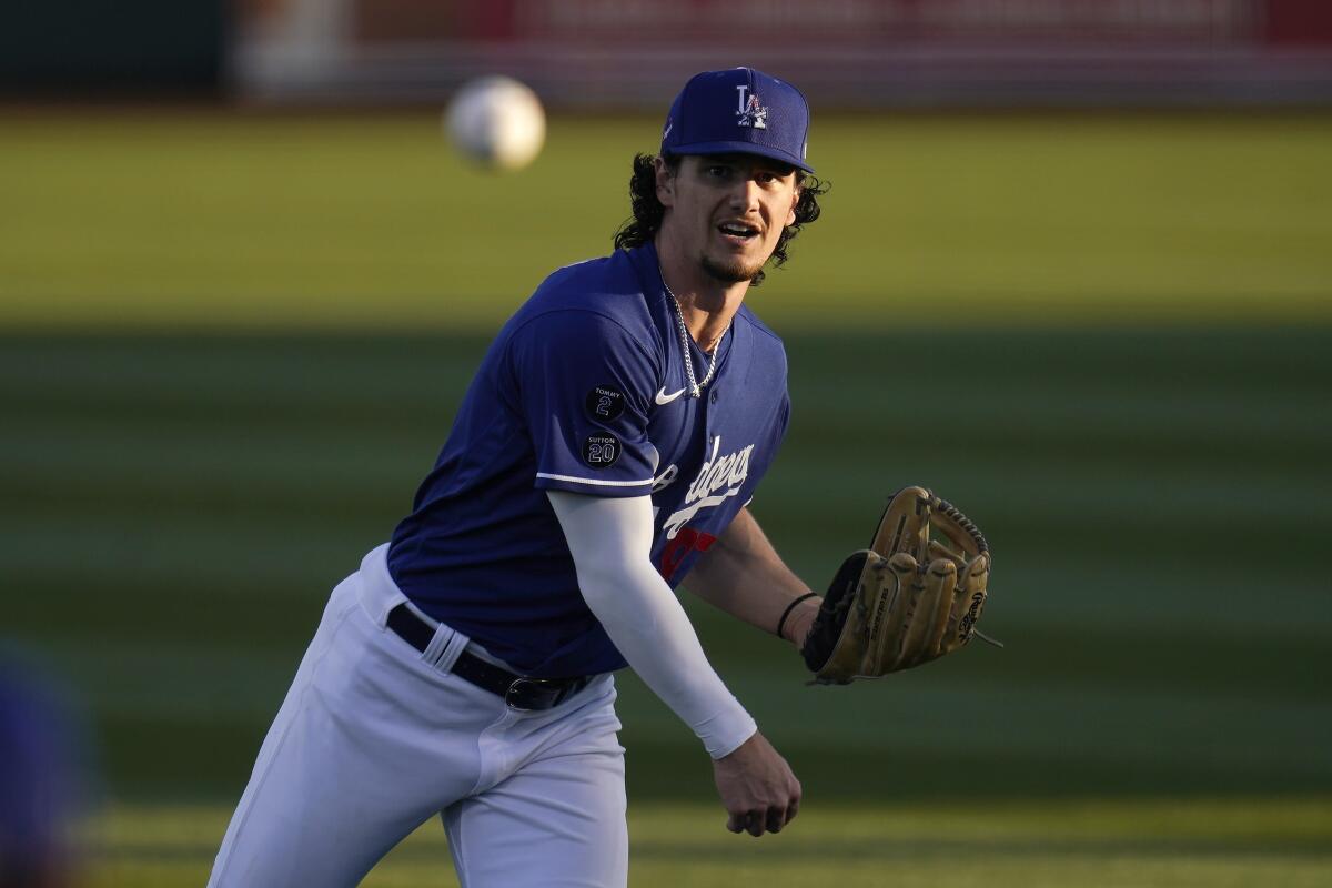 James Outman warms up before a spring training game between the Dodgers and the Chicago Cubs in March 2021.