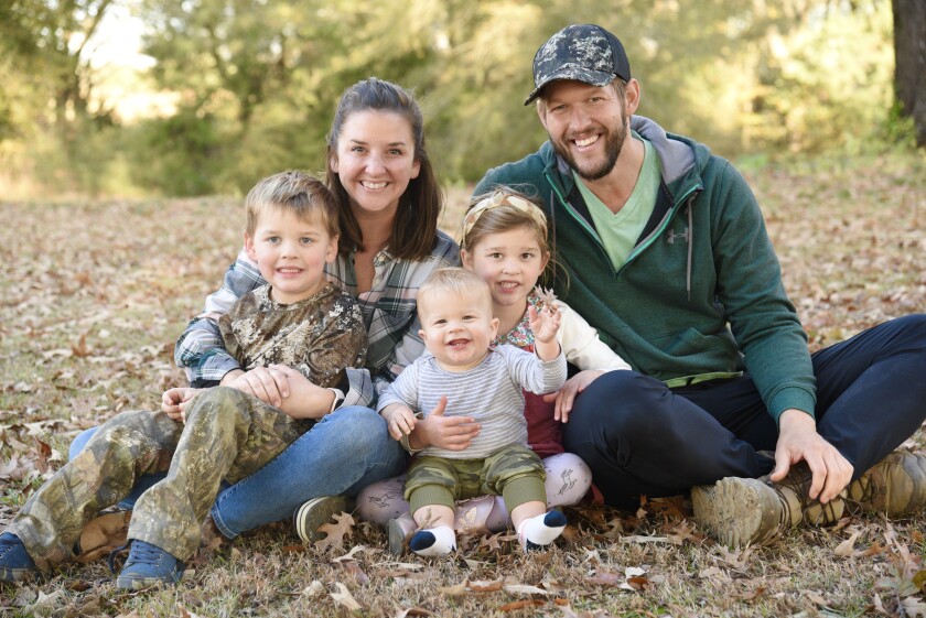 Dodger pitcher Clayton Kershaw with his wife, Ellen, and children (from L-R) Charley, Cooper, and Cali Ann.