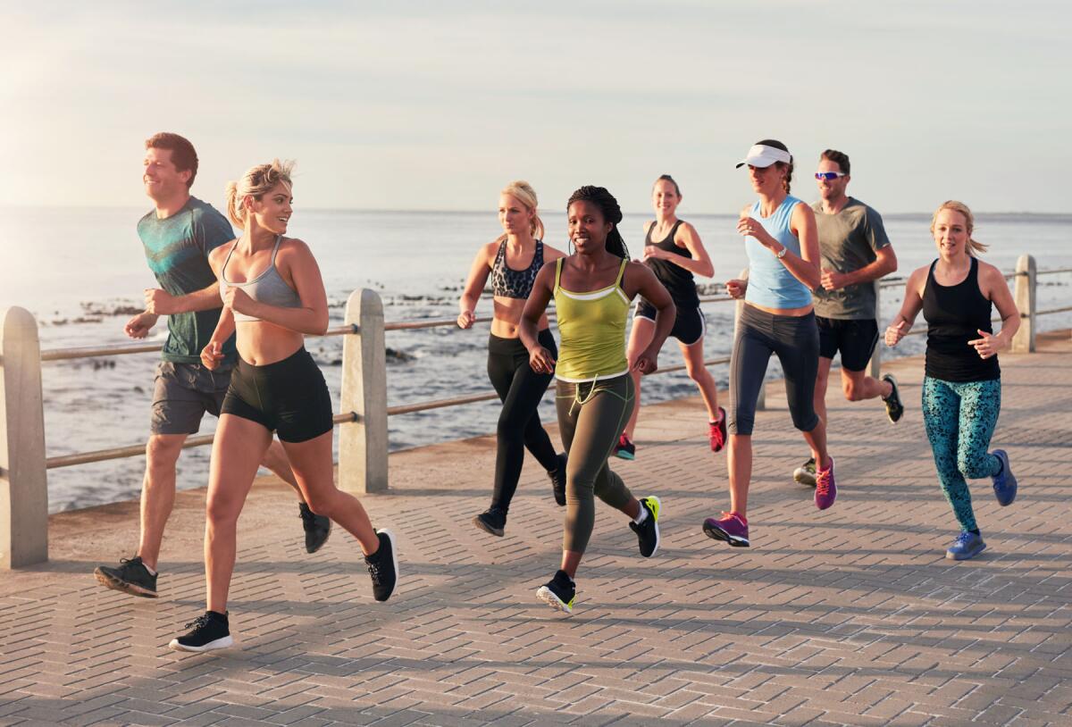 runners by the ocean