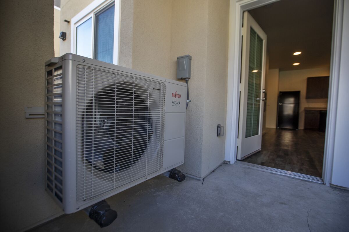 A view of an energy efficient air conditioner on the deck of a unit at the Dry Creek Villas.