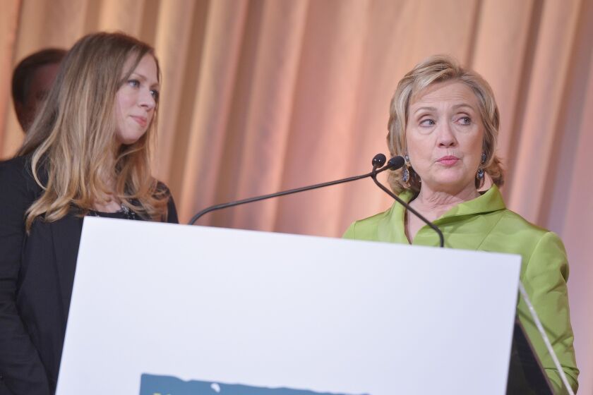 Chelsea and Hillary Clinton at the 2014 Wildlife Conservation Society Gala at New York's Central Park Zoo on Thursday.