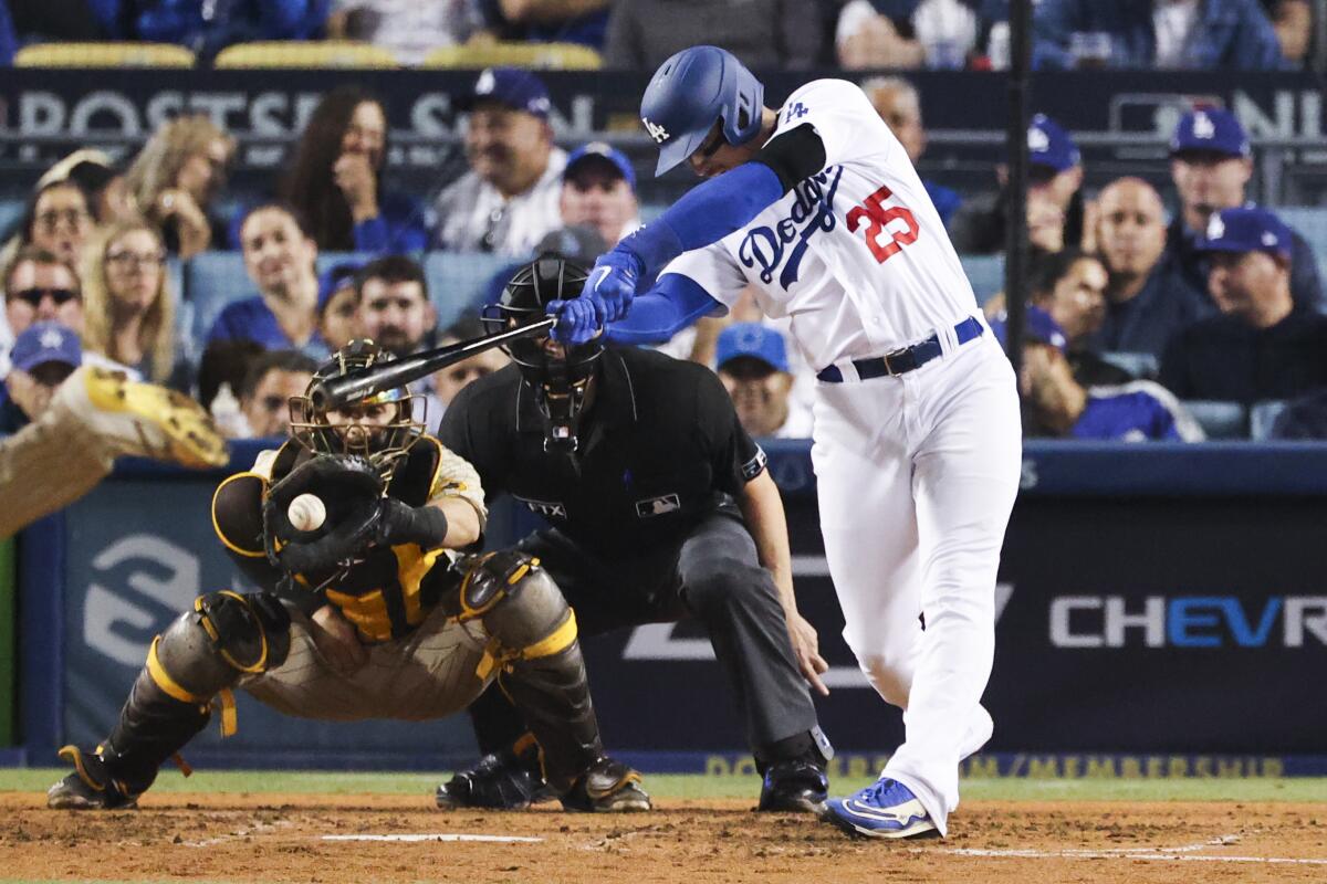 Los Angeles Dodgers' Trayce Thompson strikes out during the fourth inning.