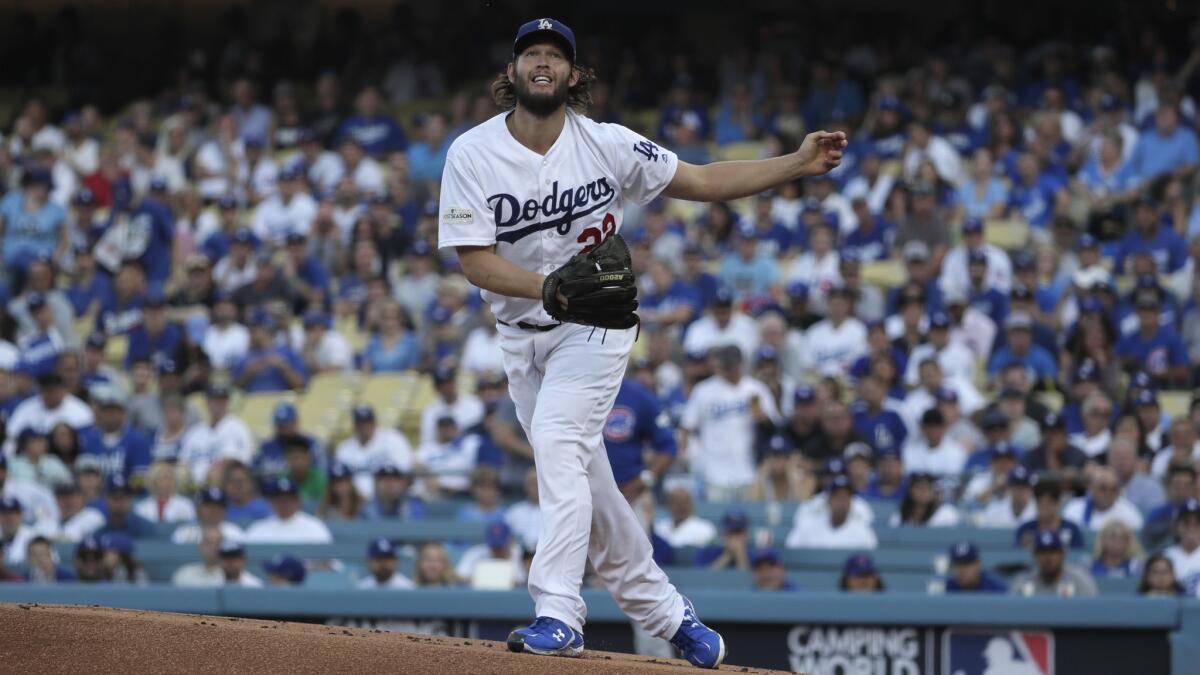 Clayton Kershaw reacts after giving up a single to Kris Bryant.