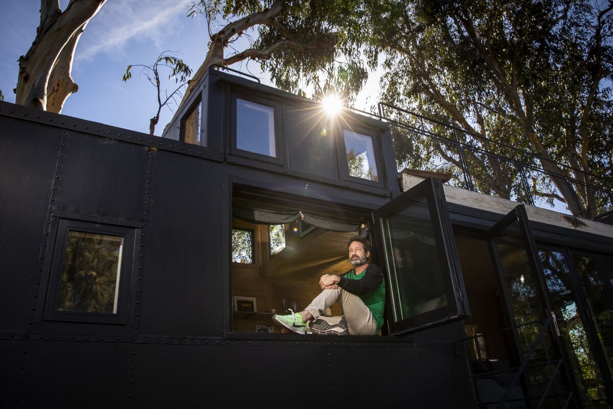 Actor and novelist David Duchovny in a converted train caboose on his Malibu property.
