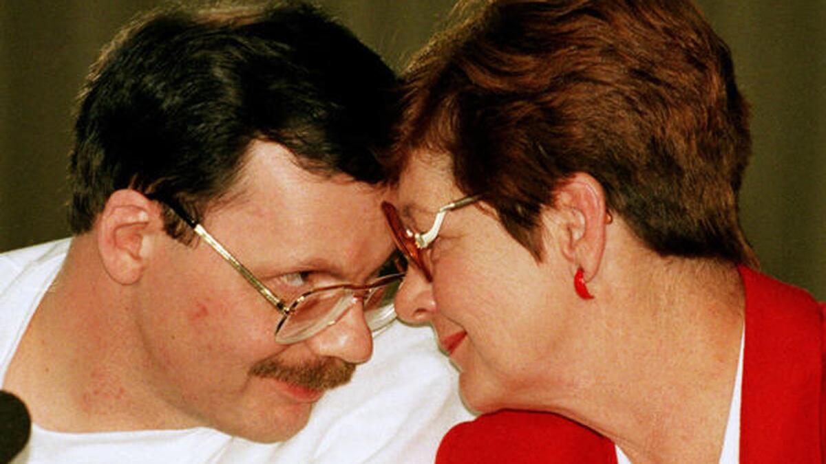 Former U.S. hostage Terry Anderson, left, and his sister Peggy Say at a Dec. 6, 1991, news conference in Wiesbaden, Germany, just two days after he was released.