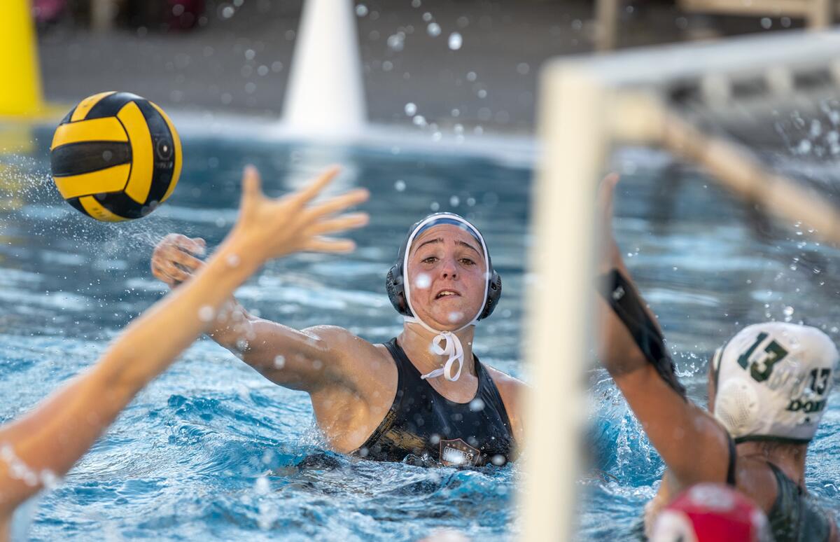 Huntington Beach's Jericho Callender takes a shot against Santa Barbara on Wednesday.