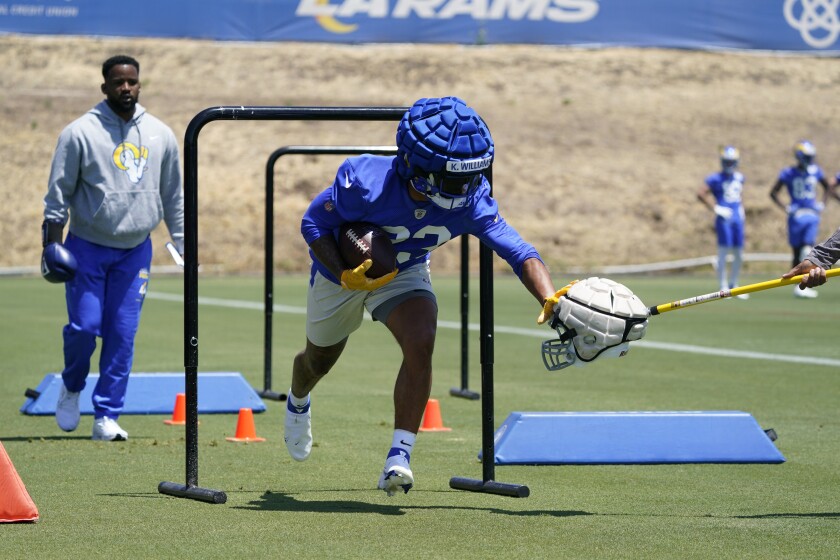 Rams running back Kyren Williams performs a drill at practice.