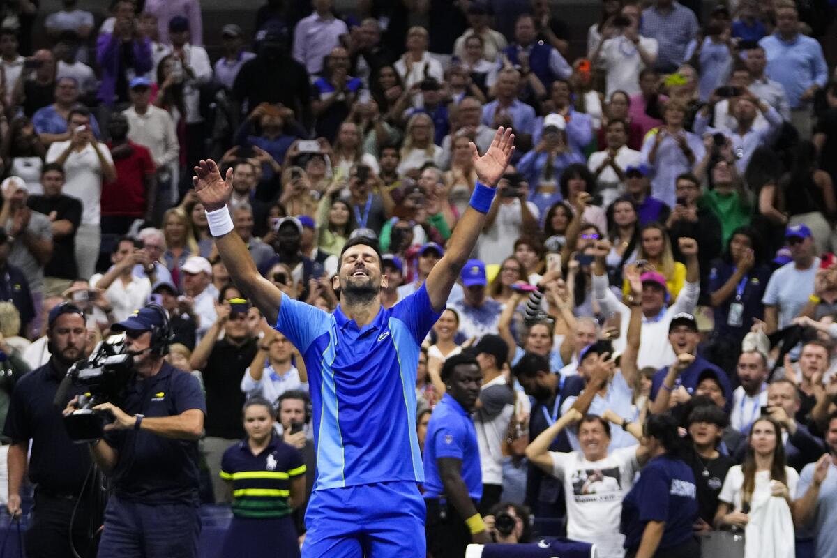Novak Djokovic celebrates after defeating Daniil Medvedev in the U.S. Open men's singles final Sunday.