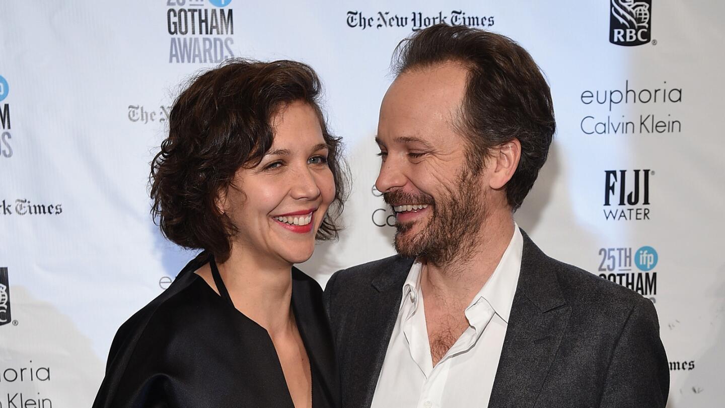 Maggie Gyllenhaal and Peter Sarsgaard have a case of the giggles on the red carpet.
