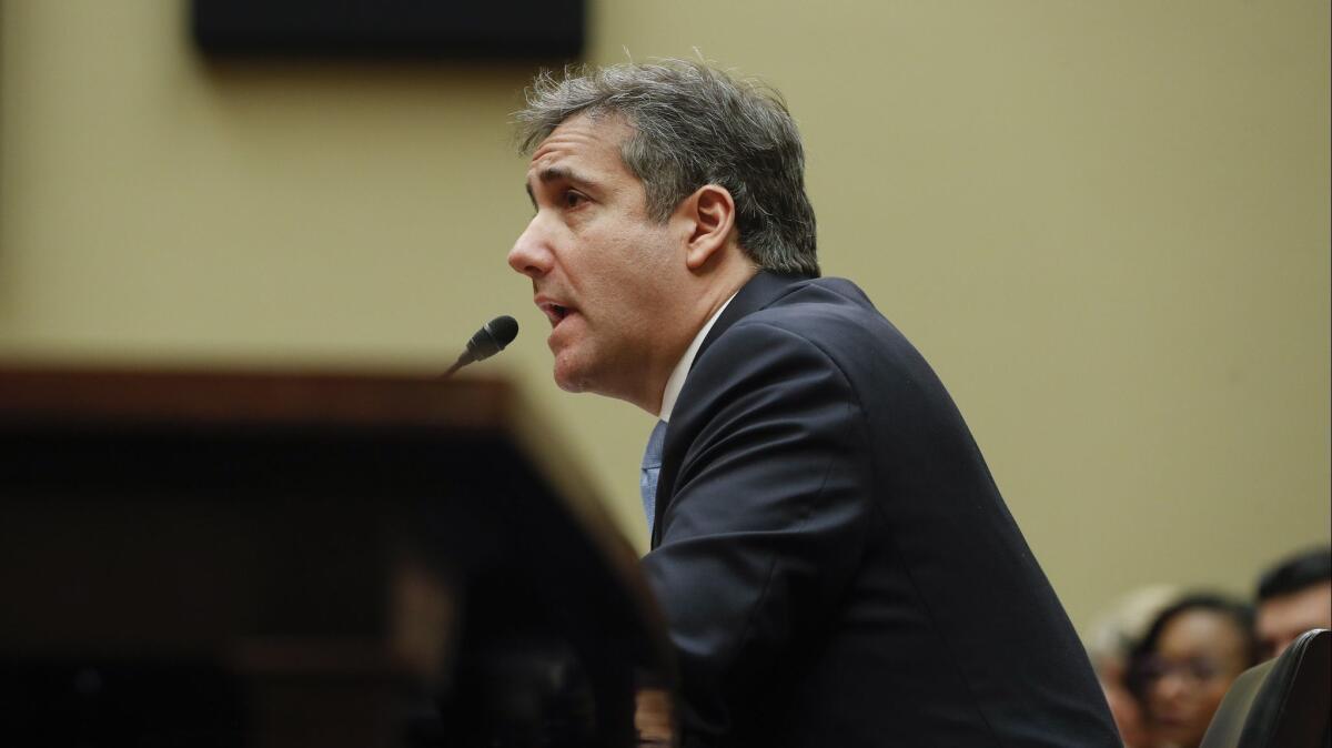 Michael Cohen, President Trump's former lawyer, testifies before the House Oversight and Reform Committee on Capitol Hill on Wednesday.