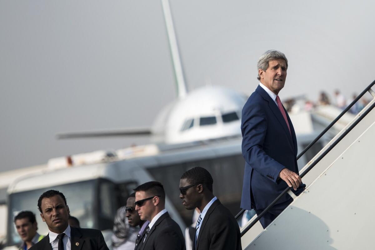 Secretary of State John F. Kerry boards his plane at Cairo International Airport on Sept. 13 as he leaves the Egyptian capital after talks on how to confront the militant group Islamic State.