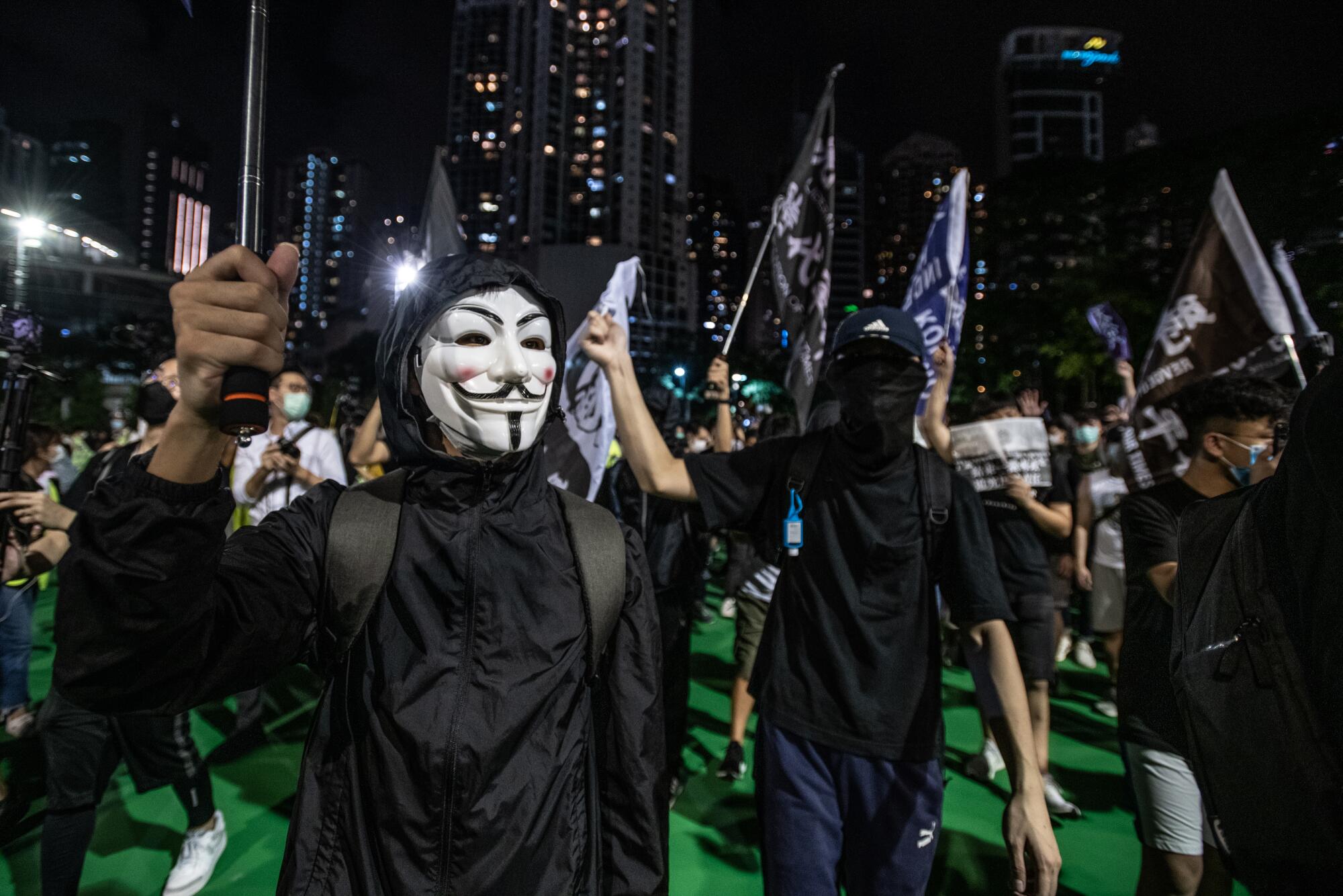 Younger protesters, some with more radical slogans like "Hong Kong independence," joined the vigil on June 4, 2020.