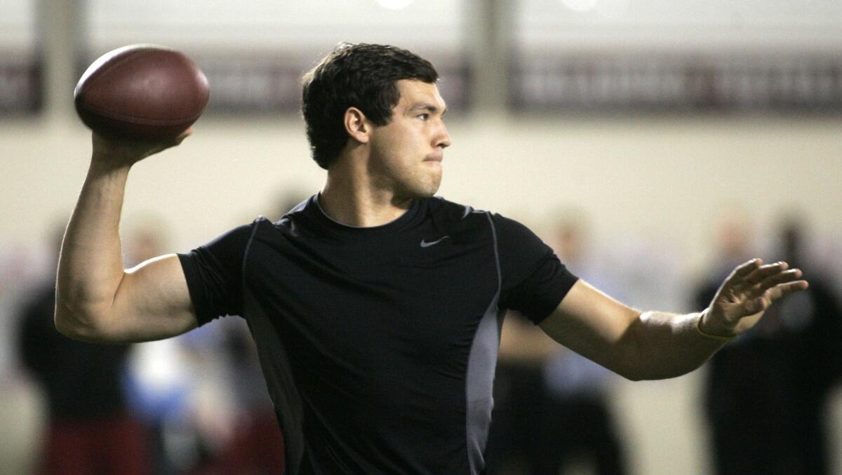 Former Oklahoma quarterback Sam Bradford throws during a workout for NFL scouts on March 29, 2010. Later that spring he was chosen No. 1 overall by the Rams.