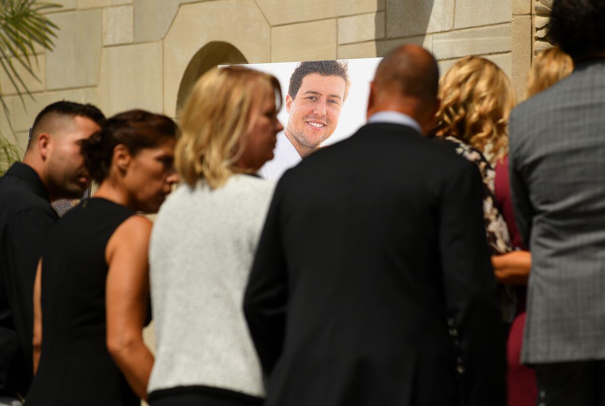 Family members of Angels pitcher Tyler Skaggs attend a memorial service on Monday.