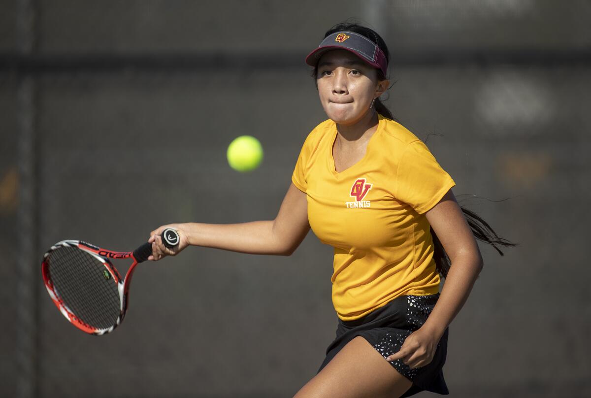 Ocean View's Jessica Lyng returns a shot from Godinez's Samantha Alarcon in a Golden West League match at home Wednesday.