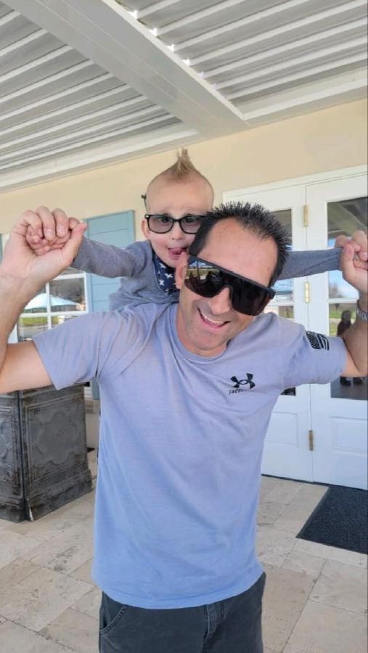 Brian Samaniego of Orange with his 3-year-old son, Krew. Krew has a rare genetic disorder called Lowe Syndrome.