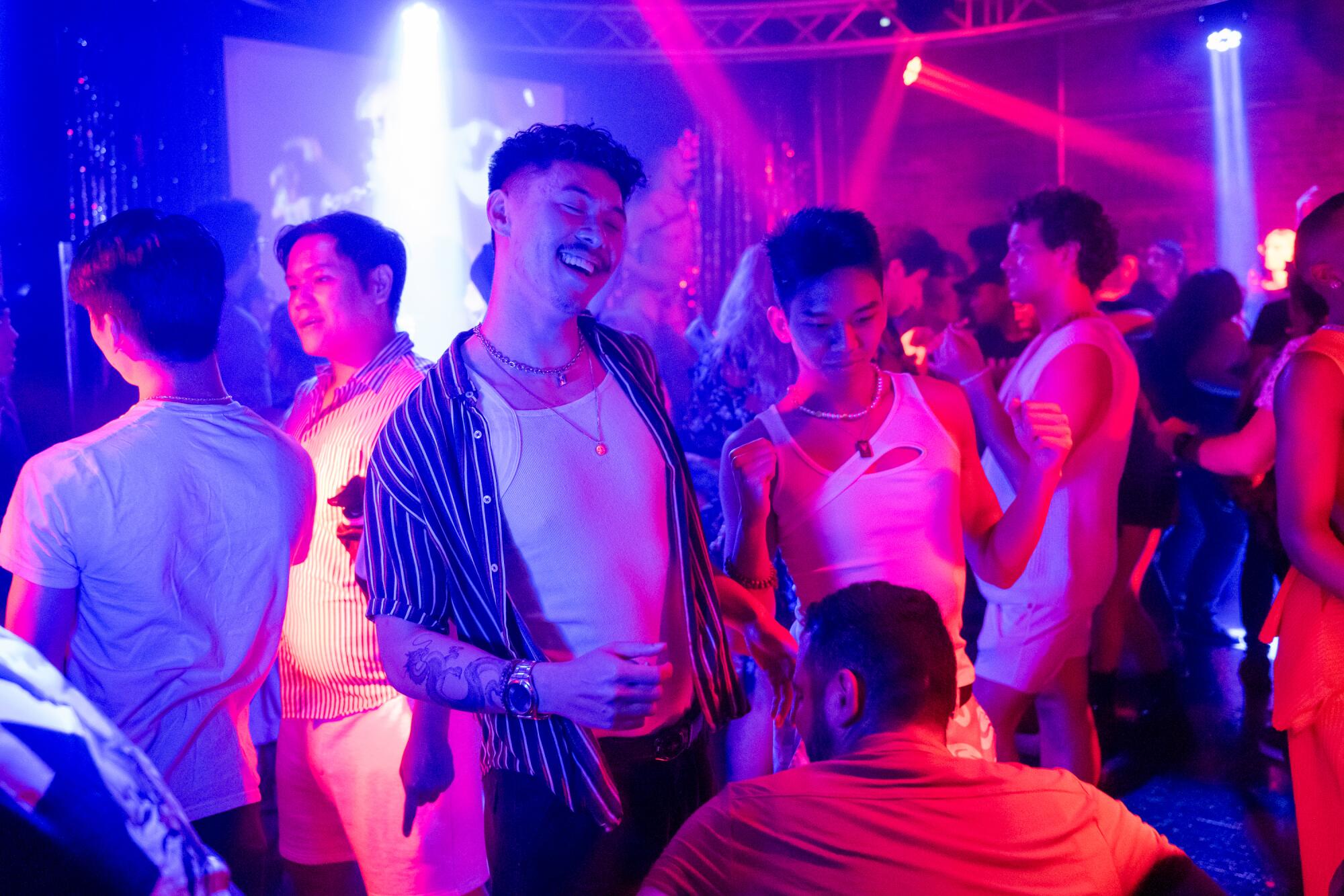 Donny Vu, center-left, and Jon dance at QT Nightlife's K-Pop Night at Micky's West Hollywood.