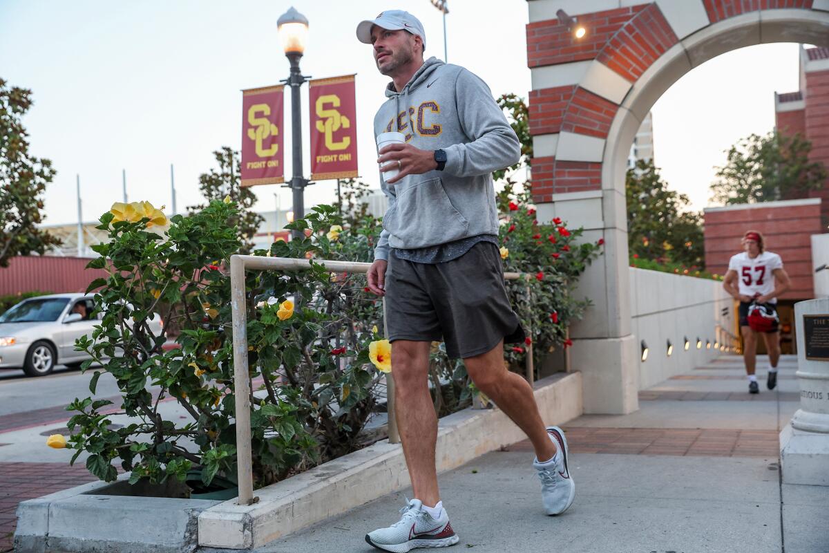 USC defensive coordinator Alex Grinch arrives at Dedeaux Field on the USC campus.