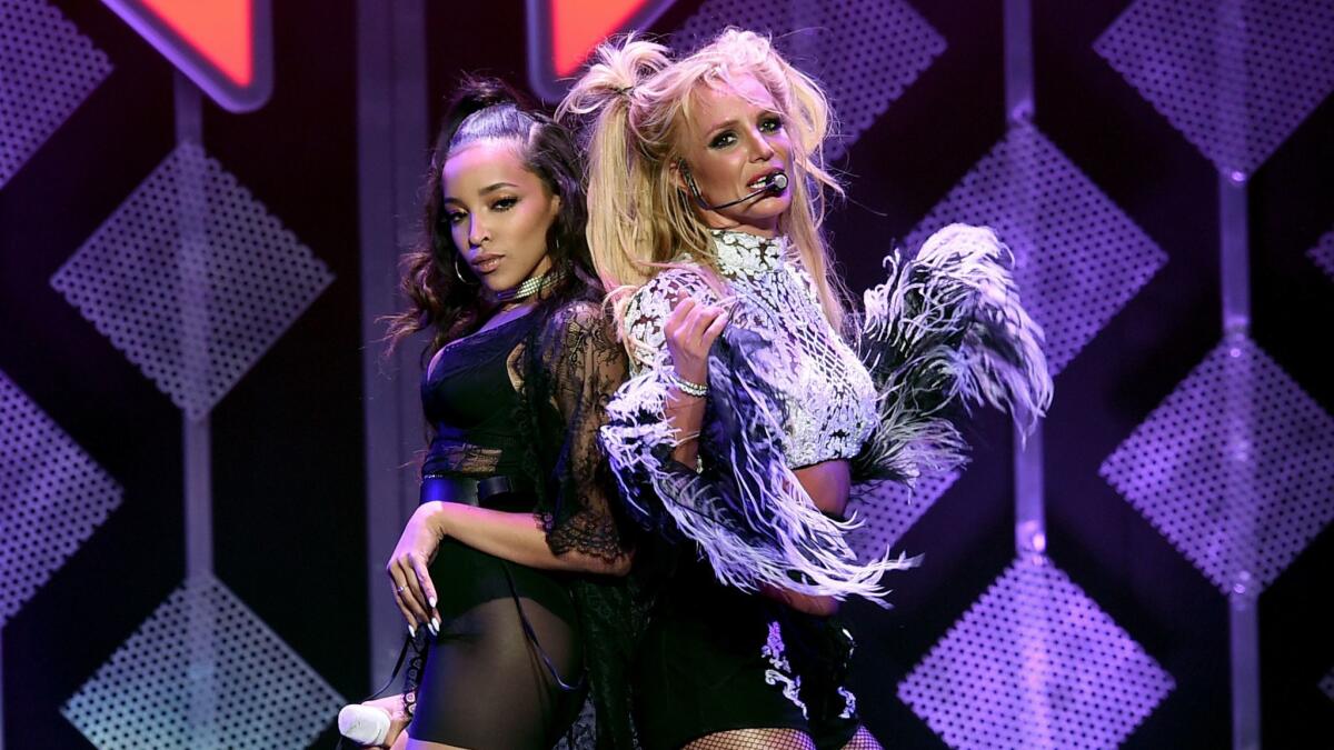 Britney Spears, right, and Tinashe.