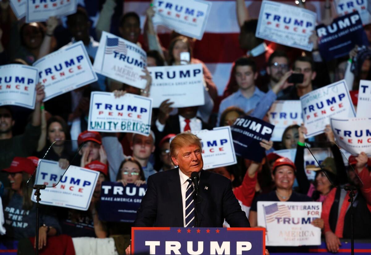 Donald Trump addresses the final rally of his presidential campaign in Grand Rapids, Mich.