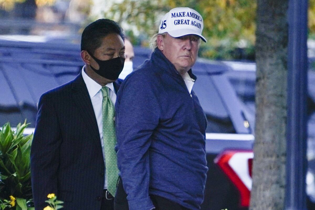 President Trump arrives at the White House on Nov. 7 after golfing.