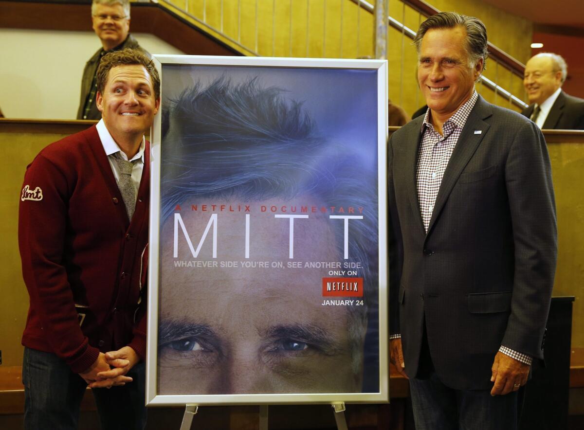Director Greg Whitely and Mitt Romney pose for a picture before the premiere of the documentary 'Mitt' during the 2014 Sundance Film Festival in Salt Lake City.