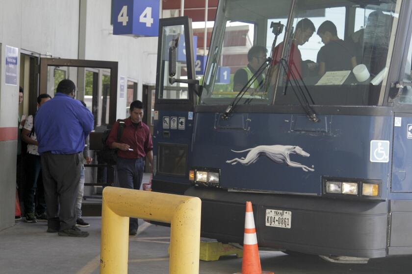 FILE - In this April 2, 2019, file photo an asylum seeker from Guatemala boards a Greyhound bus in El Paso, Texas. A Customs and Border Protection memo dated Jan. 28, 2020, obtained by The Associated Press confirms that bus companies such as Greyhound do not have to allow Border Patrol agents on board to conduct routine checks for illegal immigrants, despite the company's insistence that it has no choice but to do so. (AP Photo/Cedar Attanasio, File)