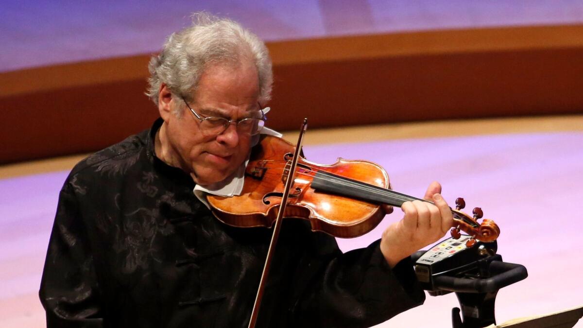 Violinist Itzhak Perlman performs at the Soraya on Thursday.