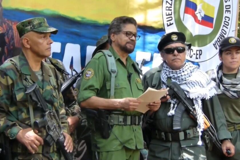 Editorial use only. HANDOUT /NO SALES Mandatory Credit: Photo by FARC VIDEO/HANDOUT/EPA-EFE/REX (10374414b) A still image taken from a handout video released by the Revolutionary Armed Forces of Colombia (FARC) on 29 August 2019 shows FARC dissident Ivan Marquez (C) with other former leaders such as Seuxis Paucias Hernandez aka 'Jesus Santrich' (2R) and Hernan Dario Velasquez (2L) aka 'El Paisa' to announce a 'new stage of the fight' in an undisclosed location. Marquez, who's whereabouts remain unknown, announced they will be taking arms to start the 'second Marquetalia', place of birth of the FARC half a century ago. FARC dissident Ivan Marquez announces they are taking up arms, Madrid, Colombia - 29 Aug 2019 ** Usable by LA, CT and MoD ONLY **