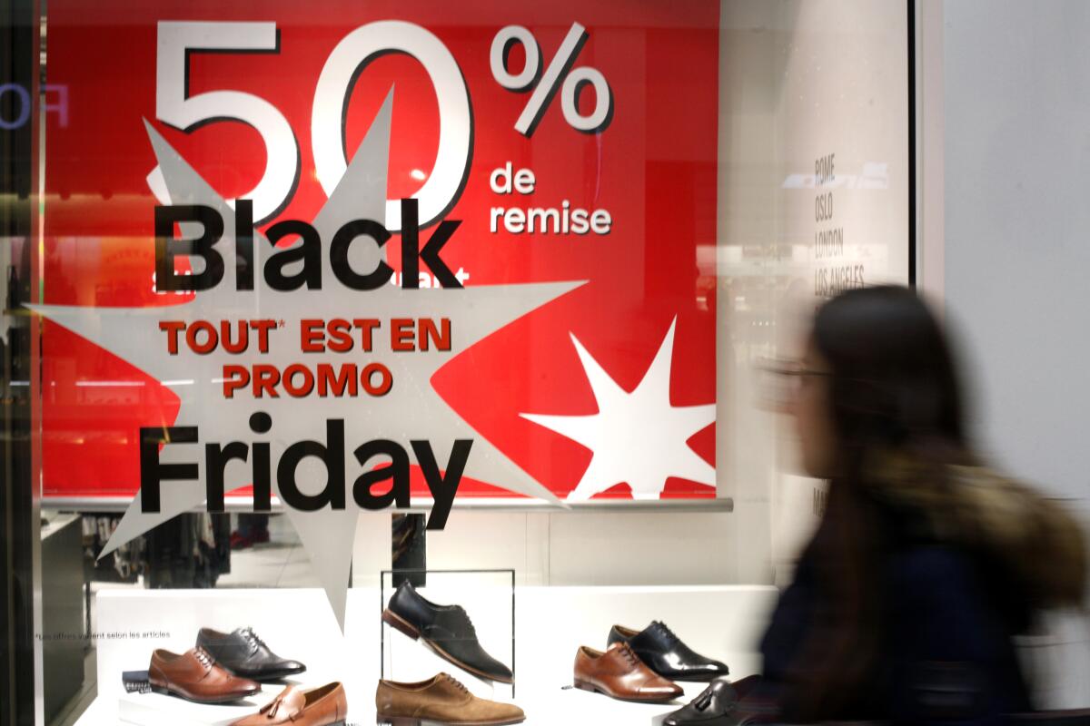 A business offers Black Friday bargains in Paris on Nov. 29. People don't celebrate the Thanksgiving holiday in Europe, but the Black Friday shopping phenomenon has spread to retailers across the Atlantic in recent years.