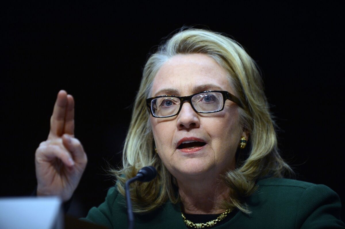 Former Secretary of State Hillary Clinton testifies before the Senate in 2013 in glasses that spawned a critique of her health by Republican strategist Karl Rove.