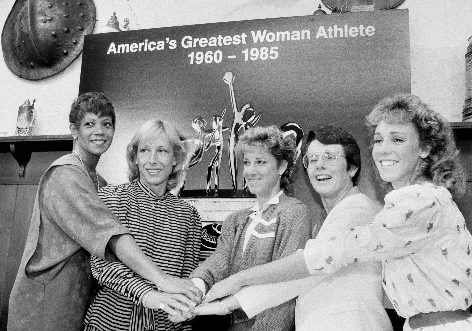 Wilma Rudolph, Martina Navratilova, Chris Evert, Billie Jean King and Mary Decker pose together in 1984.