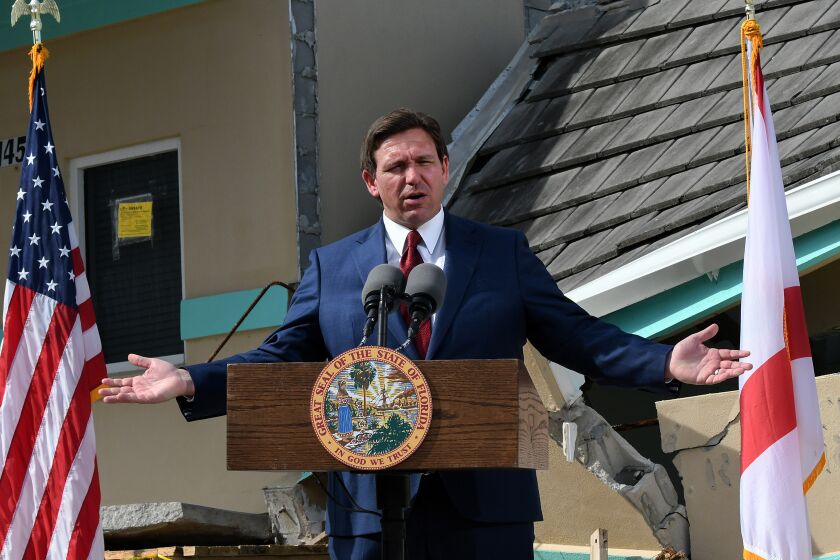 DAYTONA BEACH SHORES, FLORIDA, UNITED STATES - 2023/01/18: Florida Gov. Ron DeSantis speaks at a press conference to announce the award of $100 million for beach recovery following Hurricanes Ian and Nicole in Daytona Beach Shores in Florida. The funding will support beach projects within 16 coastal counties, with hard-hit Volusia County receiving the largest grant, over $37 million. (Photo by Paul Hennessy/SOPA Images/LightRocket via Getty Images)