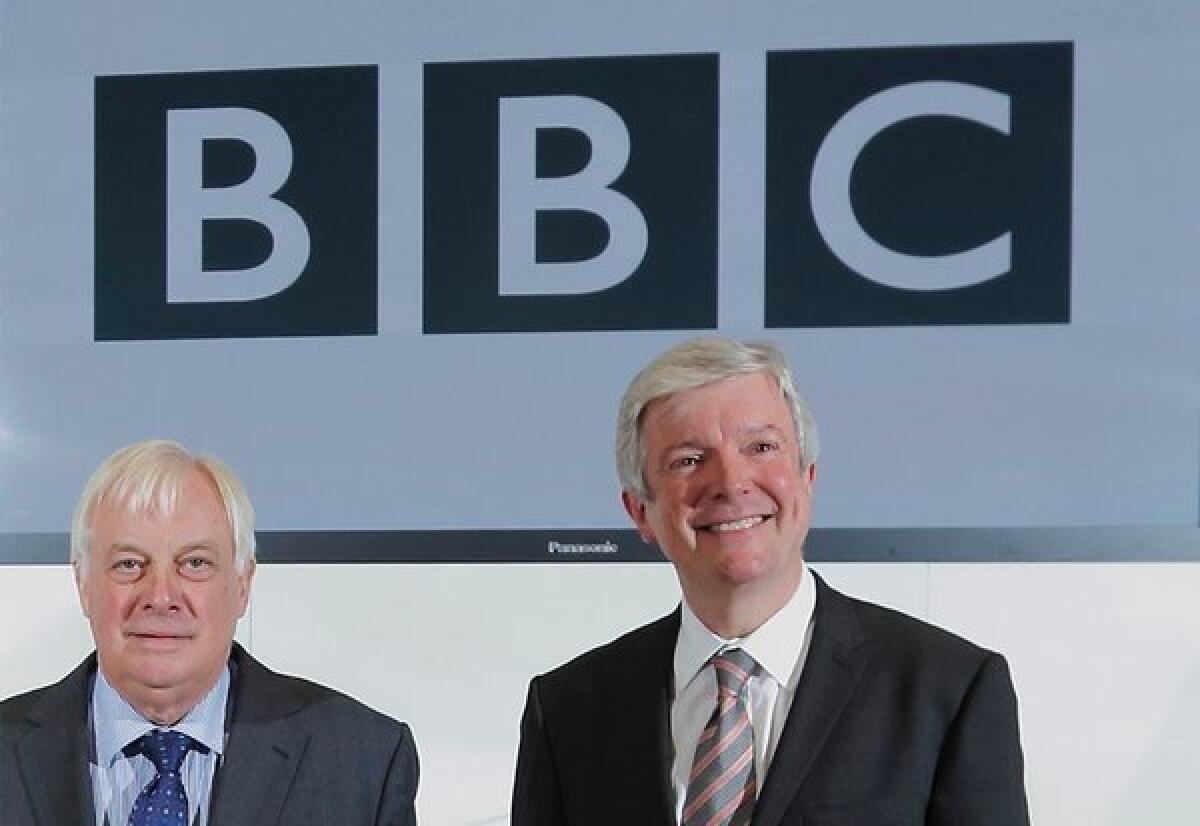Tony Hall, right, has been named director-general of the BBC. He comes from Britain's Royal Opera House, where he has served as chief executive. Hall appeared with Chris Patten, left, the head of the BBC Trust, at a news conference this week.
