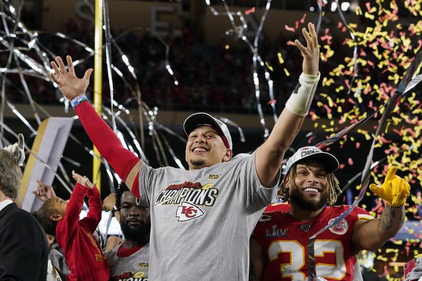 Kansas City Chiefs' Patrick Mahomes, left, and Tyrann Mathieu celebrate after defeating the San Francisco 49ers in the NFL Super Bowl 54 football game Sunday, Feb. 2, 2020, in Miami Gardens, Fla. (AP Photo/David J. Phillip)