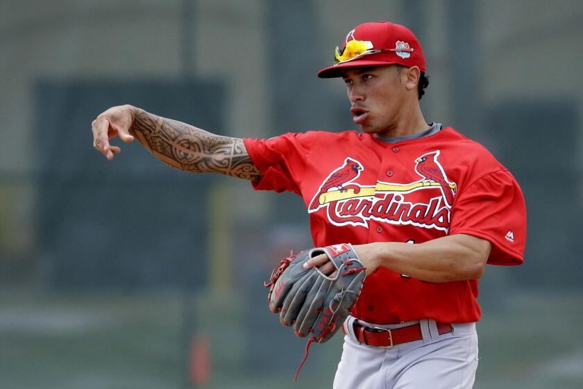 Cardinals second baseman Kolten Wong warms up between innings during spring training intrasquad game on Feb. 28.