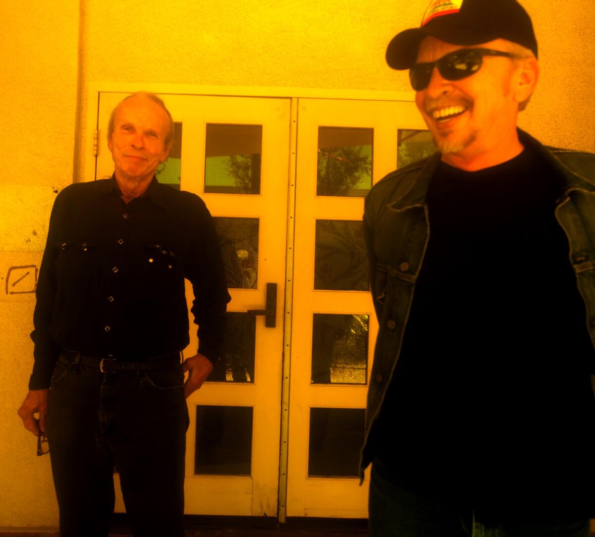 Siblings Phil, left, and Dave Alvin in Downey on Aug. 31, 2015. The brothers' new album, "Lost Time," further explores the blues and R&B influences that inspired the Downey residents as kids before they grew up and formed the Blasters roots-rock band.