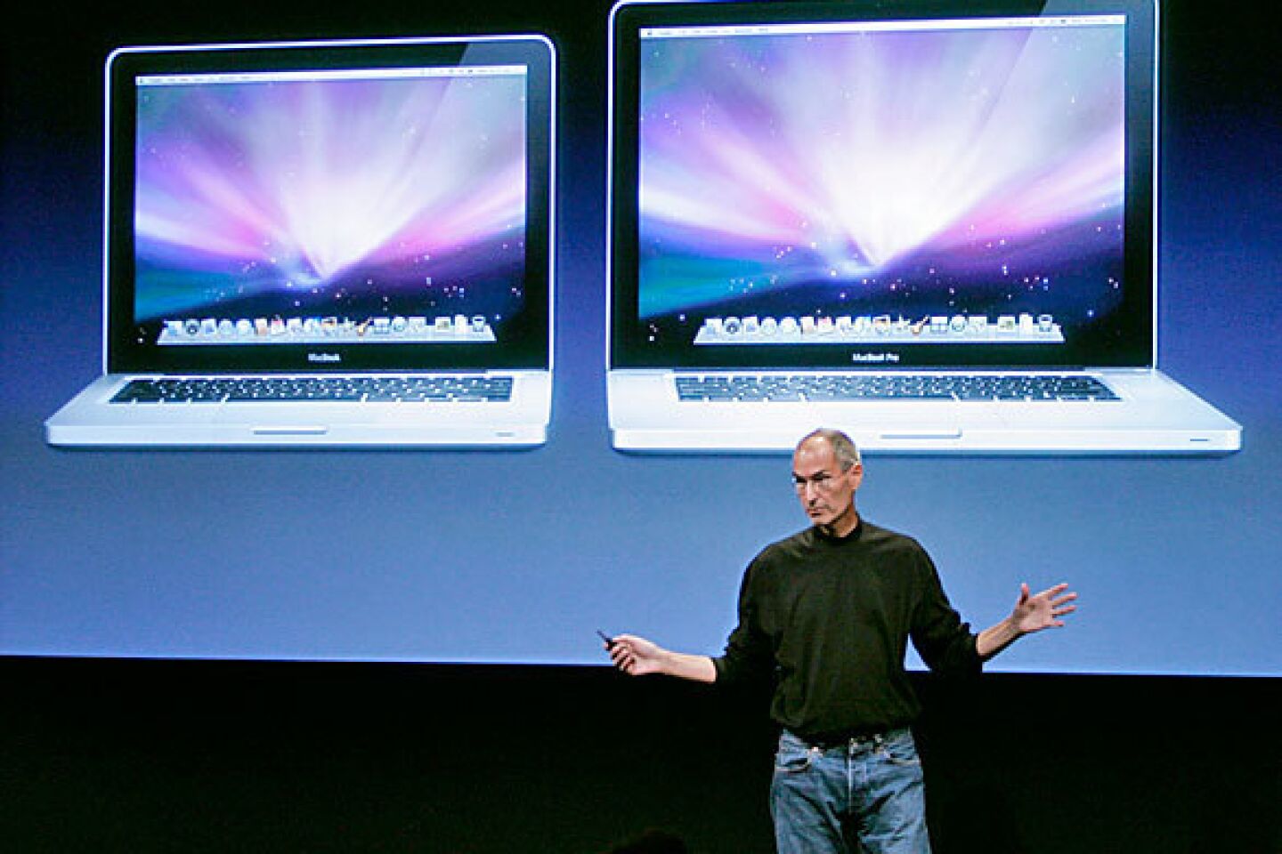 Jobs introduces new versions of the MacBook, left, and MacBook Pro at Apple headquarters in Cupertino, Calif.