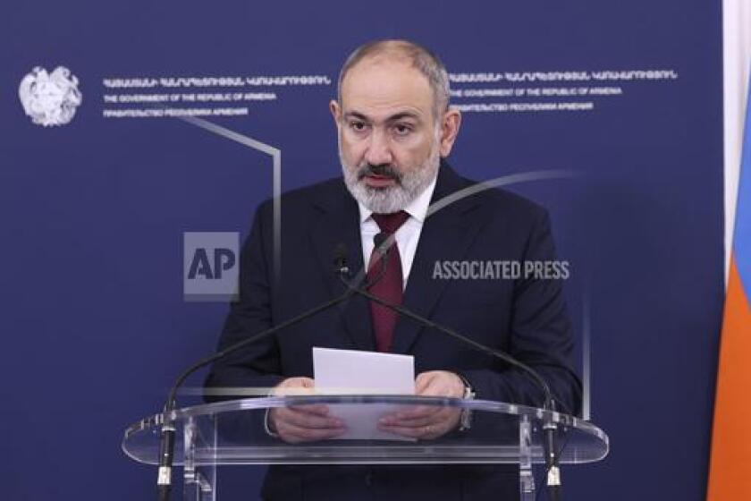 Armenia's Prime Minister Nikol Pashinyan speaks during joint statements with NATO Secretary General Jens Stoltenberg after their meeting in Yerevan, Armenia, Tuesday, March 19, 2024. (Stepan Poghosyan/Photolure via AP)