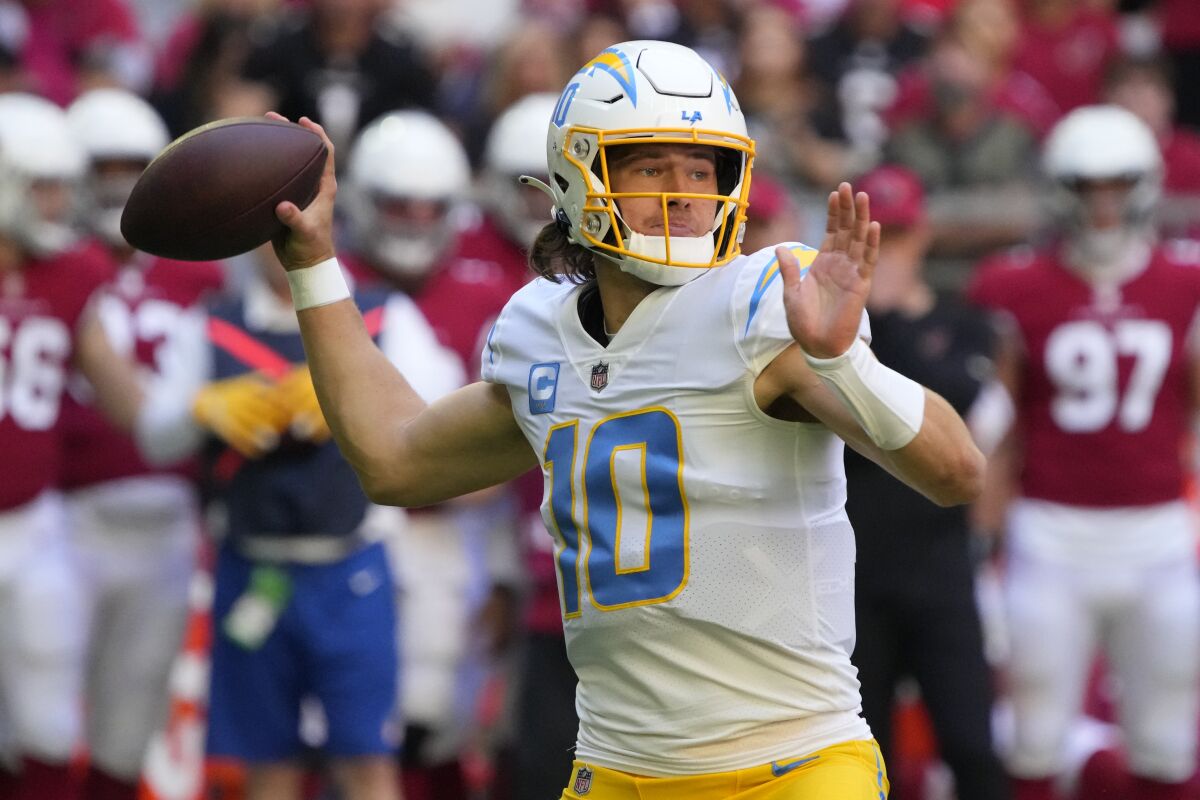 Chargers quarterback Justin Herbert passes during a win over the Arizona Cardinals on Nov. 27.