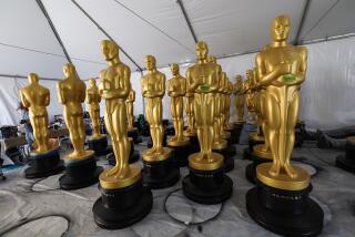 Los Angeles, CA, Thursday, March 9, 2023 – Oscar statues await touch-ups as work continues on Hollywood Blvd. in preparation for the 95th Academy Awards.  (Robert Gauthier/Los Angeles Times)