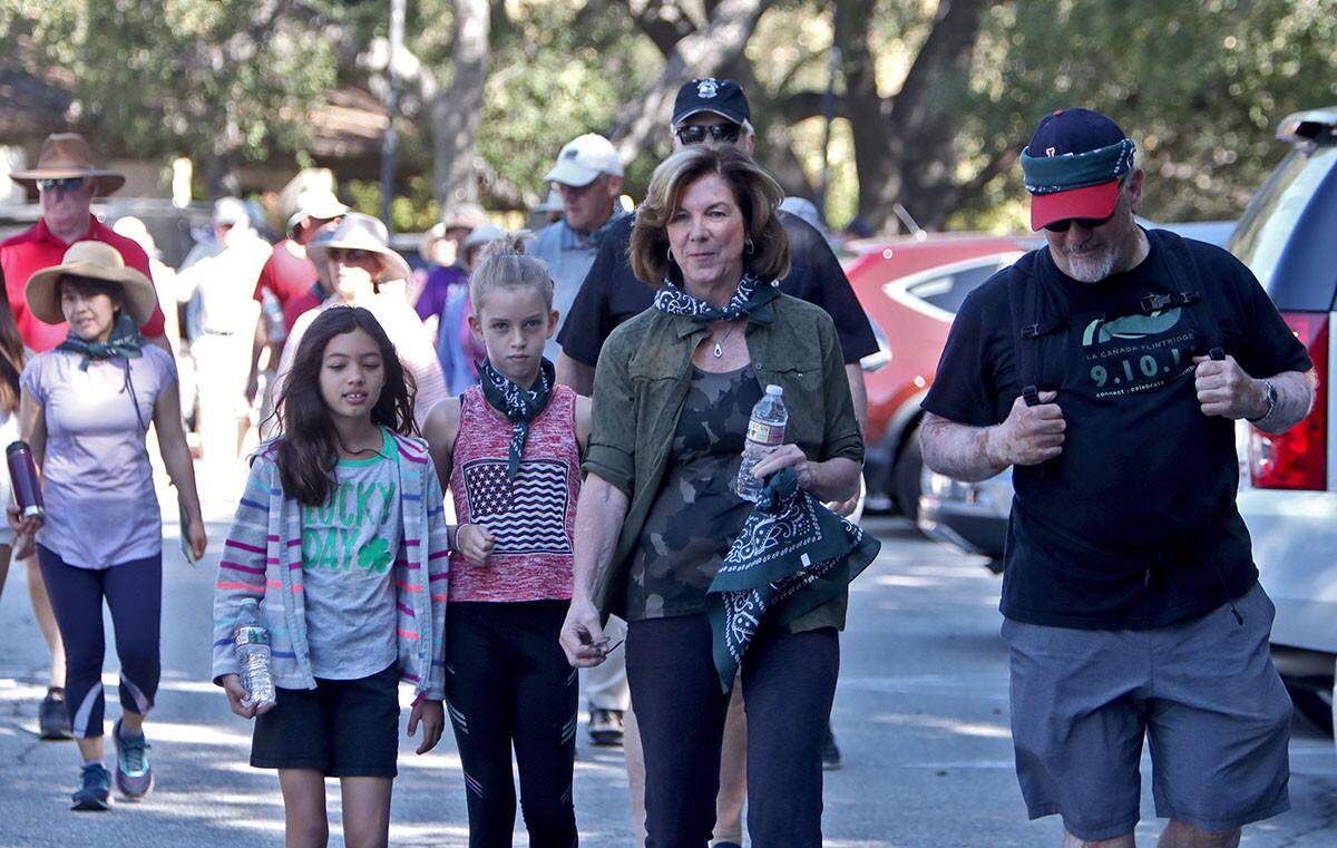 Mayor Terry Walker, center, leads about 50 walkers on the annual Mayorâ€™s Hike, in La Canada Flintridge on Saturday, Nov. 3, 2018. The event this year, which started and ended at the Flintridge Riding Club, was called â€œWalkerâ€™s Walkabout."
