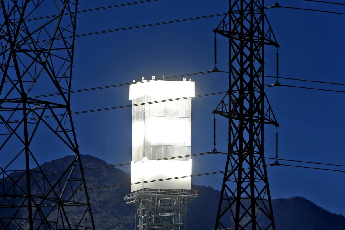 A tower is glowing hot at the Ivanpah Solar Electric Generating System in California's Mojave Desert. 
