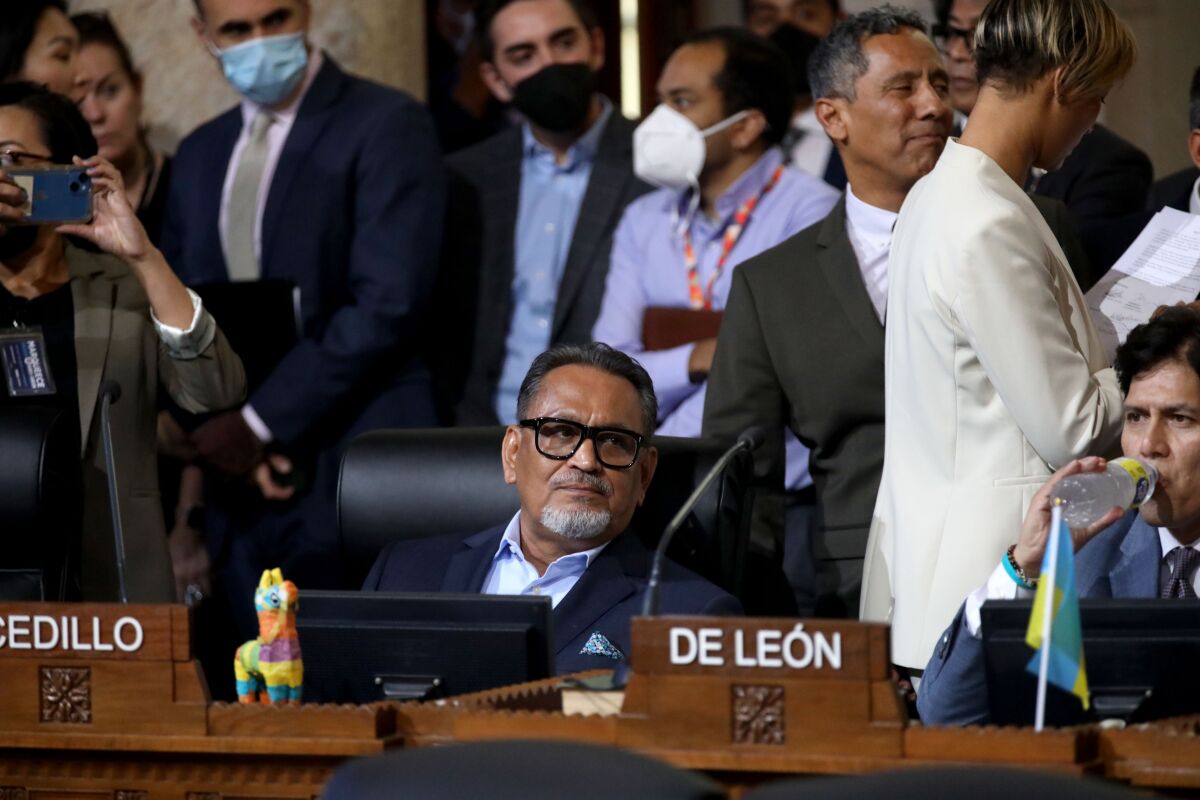 Gil Cedillo, center, at Tuesday Los Angeles City Council meeting