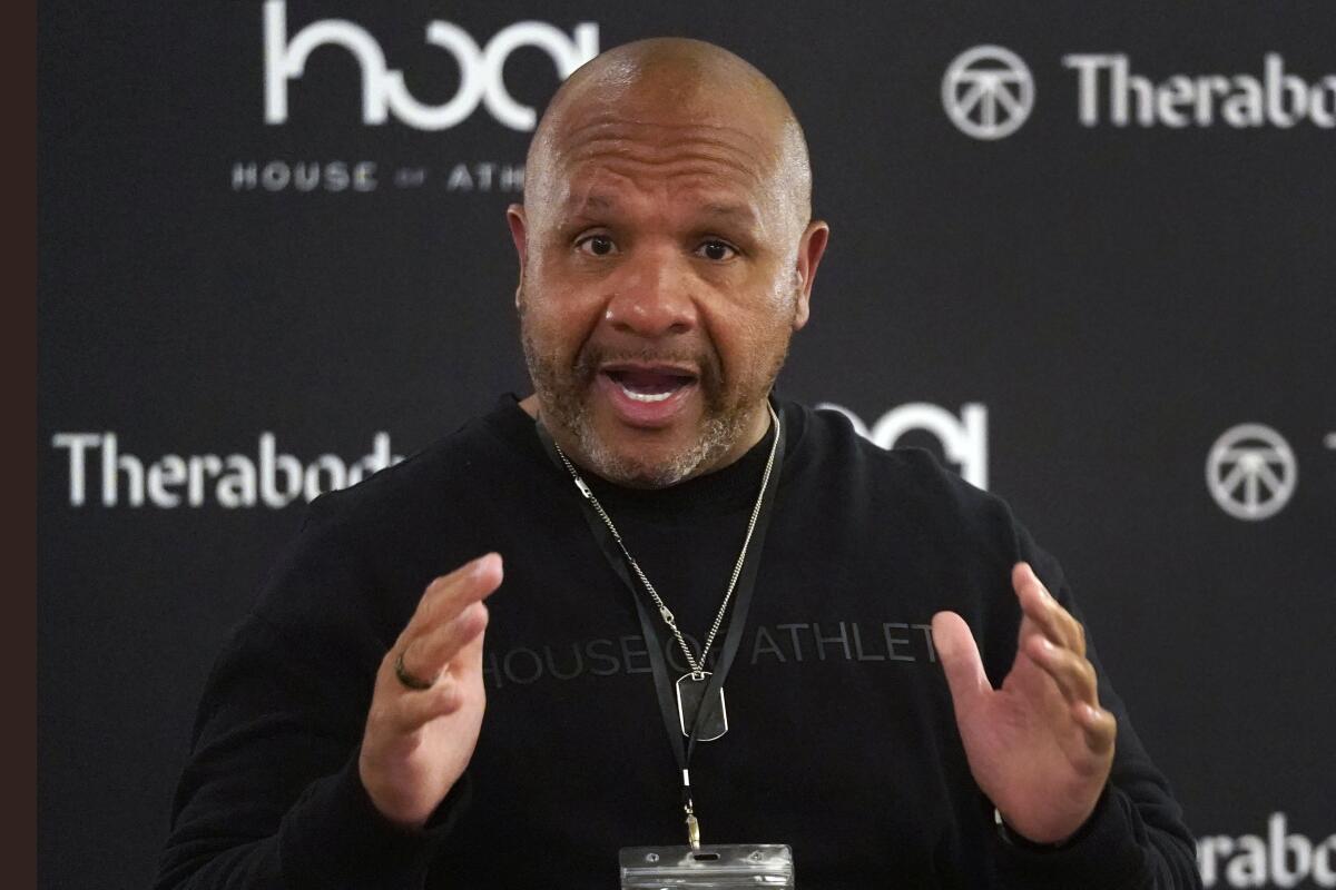 Former Cleveland Browns head coach Hue Jackson speaks during a news conference.