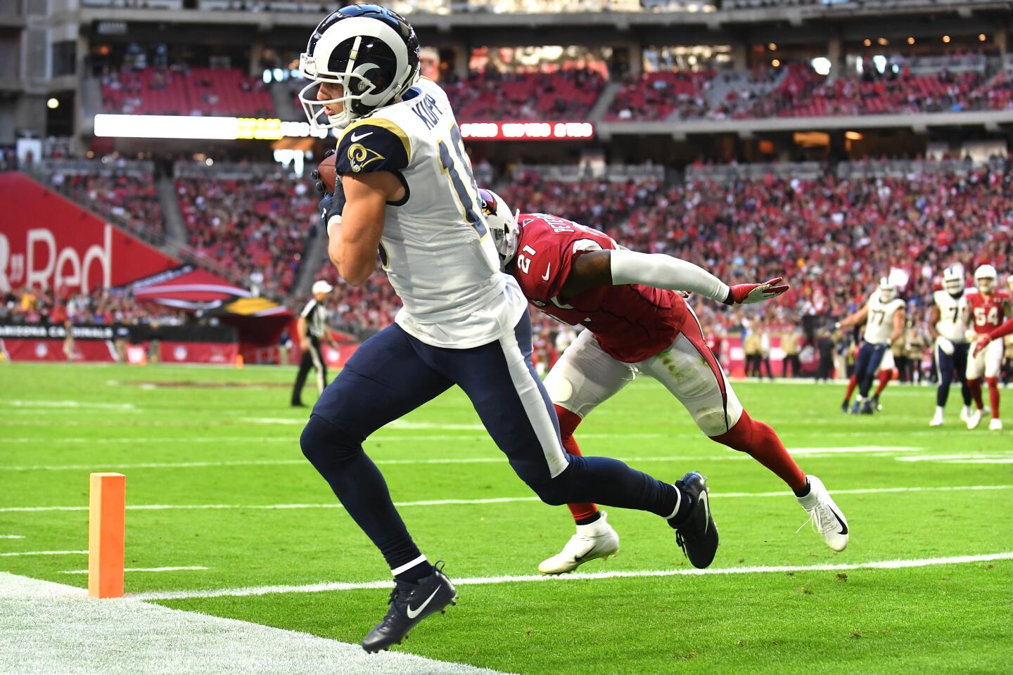 Rams wide receiver Cooper Kupp catches a touchdown pass in front of Cardinals cornerback Patrick Peterson.